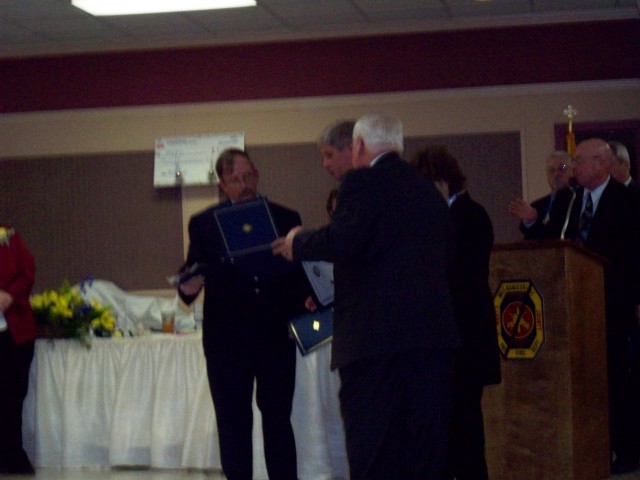 B.K. Abell receiving his length of service award